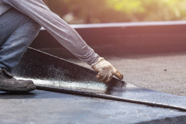 Professional Waterproofing technician working in Pittsford, MI